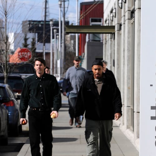 FILE - A sign for the Seattle office of Getty Images Inc., is shown Monday, Feb. 25, 2008, in Seattle. (AP Photo/Ted S. Warren, File)