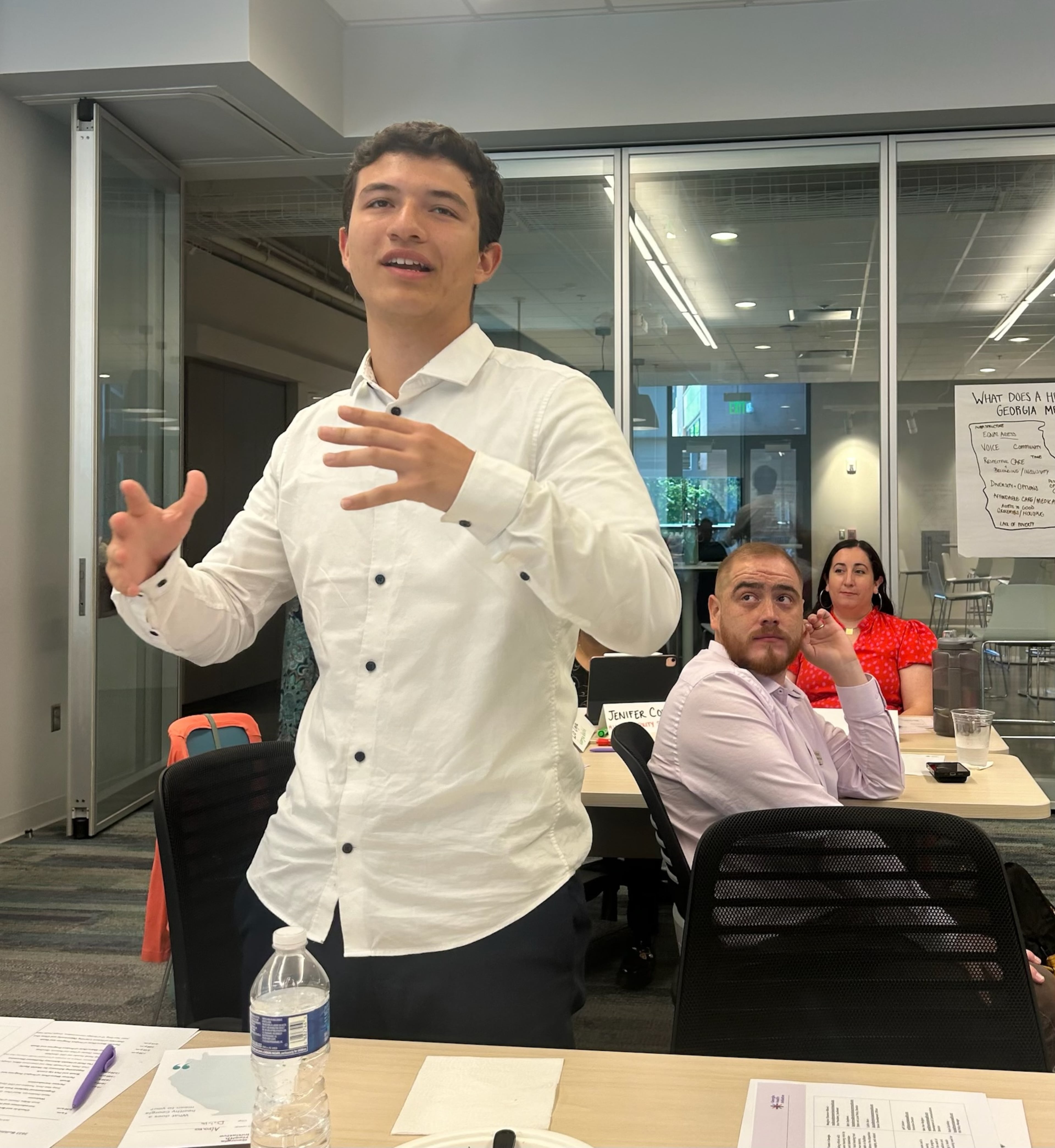 Alvaro Saldarriaga Arcila, a senior at McClure Health Science High School in Gwinnett County and a member of the HealthMPowers Youth Advisory Board, speaks during a meeting of the Georgia Health Initiative about the organization's programs to encourage young people to eat healthier. (Courtesy of HealthMPowers)