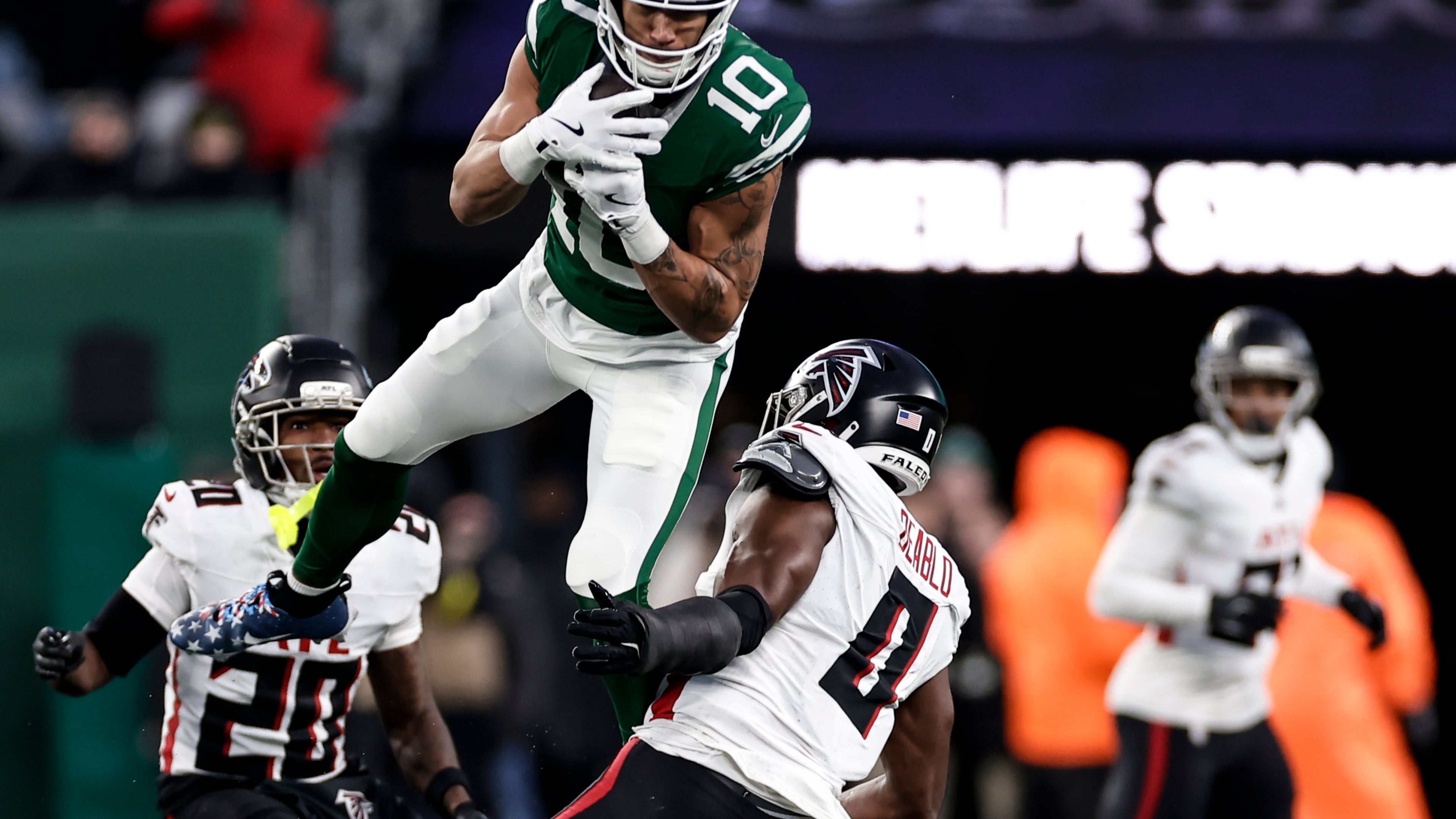 New York Jets wide receiver Allen Lazard (10) makes a catch against Atlanta Falcons during the second half of an NFL football game, Sunday, Nov. 30, 2025, in East Rutherford, N.J. (AP Photo/Adam Hunger)