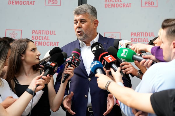 Romanian Prime Minister Marcel Ciolacu speaks to media at the PSD headquarters, in Bucharest, Romania, Monday, May 5, 2025, the day after the governing coalition's candidate failed to advance to the runoff in the presidential election rerun. (AP Photo/Andreea Alexandru)