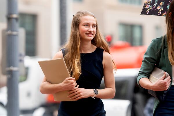 High school runner Gracelyn Laudermilch, who objects to a landmark settlement with the NCAA, arrives at federal court on Monday, April 7, 2025, in Oakland, Calif. (AP Photo/Noah Berger)