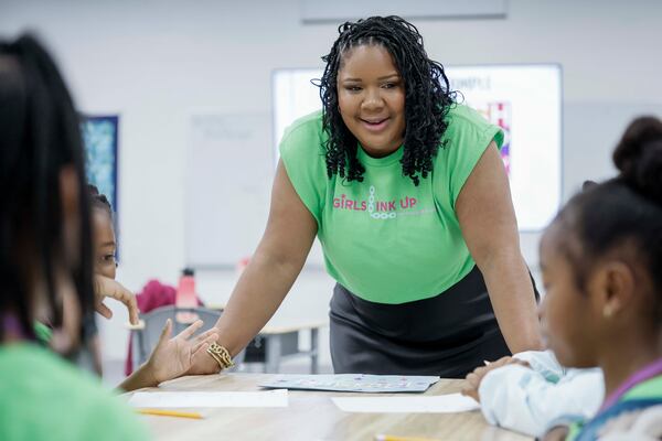 Raioni Madison interacts with a third grade group as they work during the first day of the 3D Girls summer camp at Ethos Classical Middle School on Monday, June 1, 2026. (Miguel Martinez/AJC)