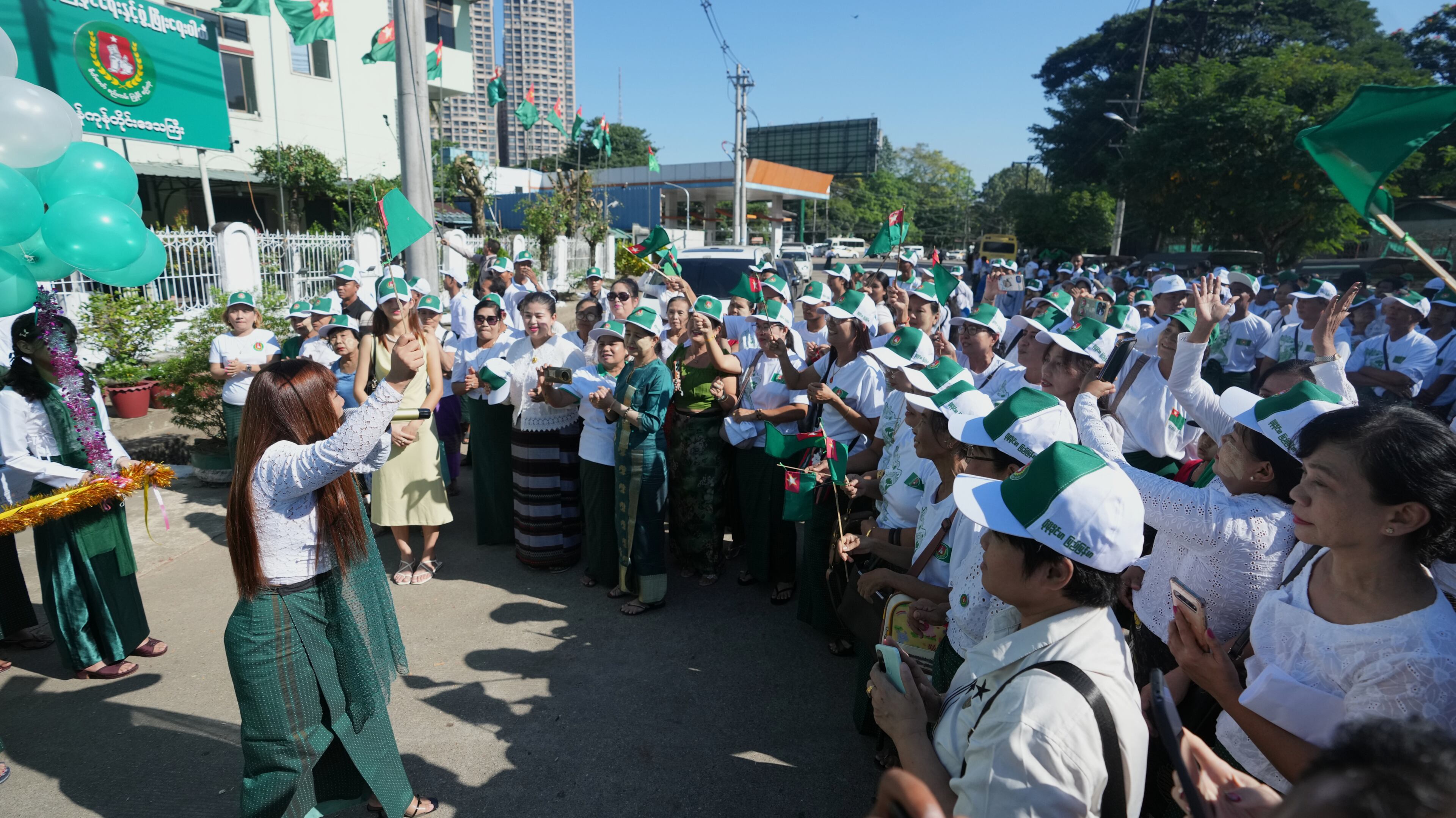 FILE - Members of the military-backed Union Solidarity and Development Party (USDP) gather for opening ceremony of the party's slogan poster during the first day of election campaign for upcoming general election at their Yangon region party's headquarters Tuesday, Oct. 28, 2025, in Yangon, Myanmar. (AP Photo/Thein Zaw, File)