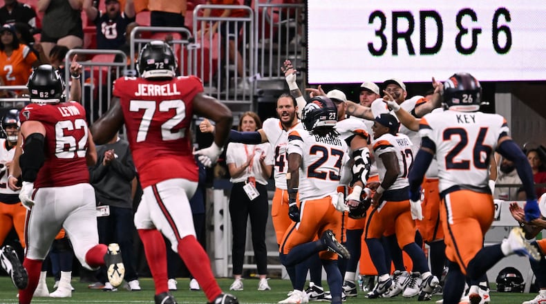 Denver Broncos cornerback Jahdae Barron runs for a touchdown after intercepting the ball during the first half of an NFL preseason game at Mercedes-Benz Stadium on Friday, Aug. 14, 2026, in Atlanta. (Hyosub Shin/AJC)
