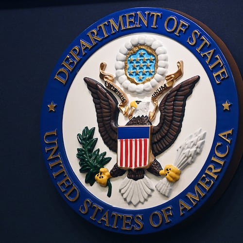 FILE - The State Department seal is seen on the briefing room lectern at the State Department in Washington, Jan. 31, 2022. (Mandel Ngan, Pool via AP, File)