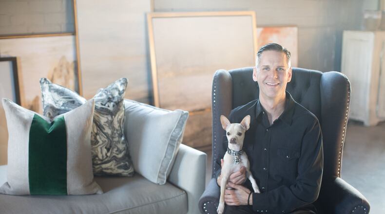 Designer Jimmy Stanton is the owner of Stanton Home Furnishings, located in Atlanta’s Westside Design District. He is shown with Champ, his chihuahua. Contributed by Jeff Roffman Photography