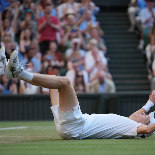 Jannik Sinner of Italy celebrates after winning a point against Alexander Zverev of Germany men's singles final at Wimbledon Tennis Championships in London, Sunday, July 12, 2026. (AP Photo/Kin Cheung)