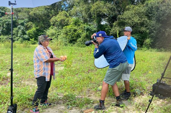 Hector Amador and Miguel Martinez work on "Our Essential Heroes," a video and photo project that celebrates Hispanic essential workers. (Courtesy of Miguel Martinez)