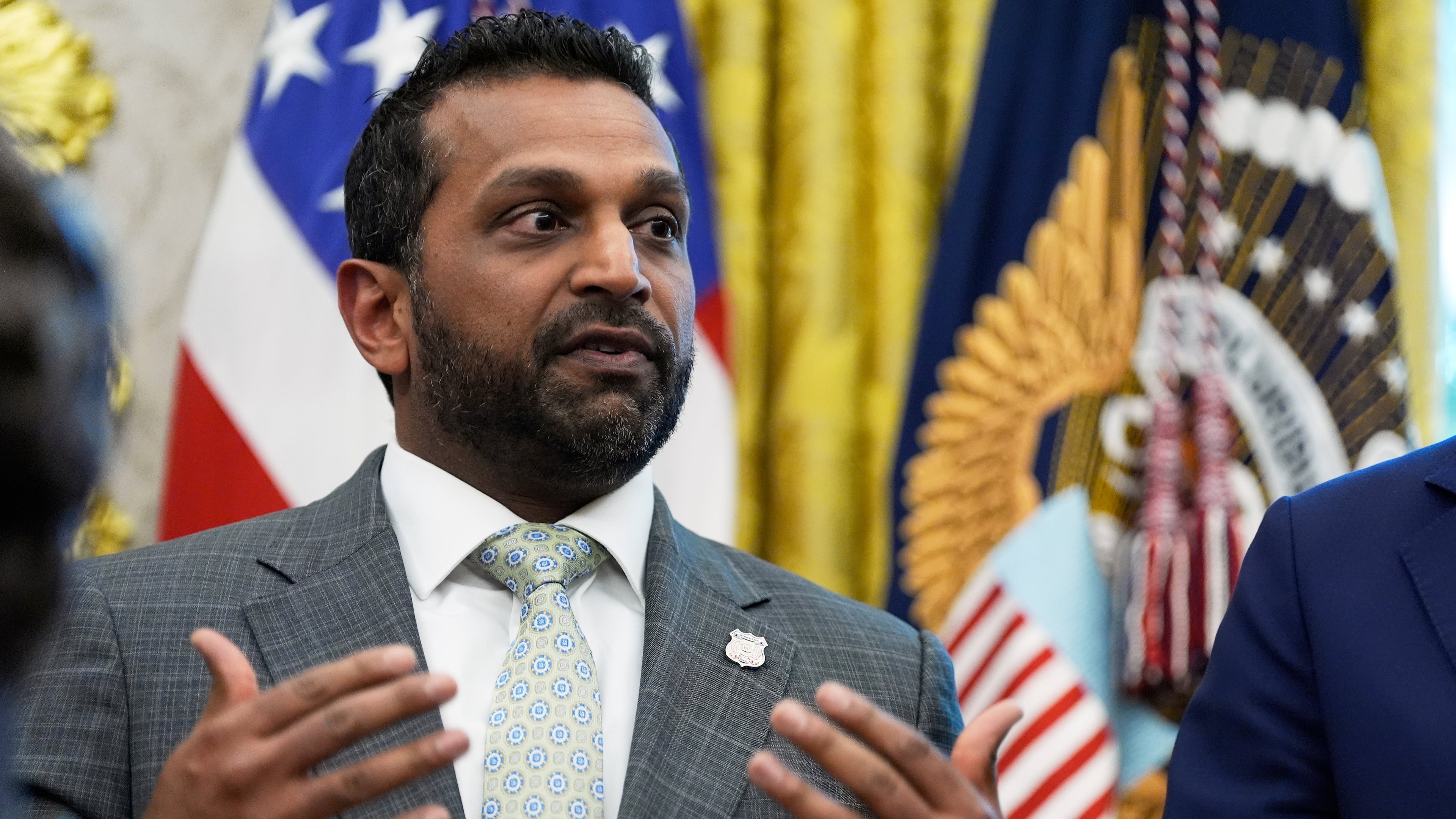 FBI Director Kash Patel speaks before President Donald Trump signs a memorandum in the Oval Office of the White House, Monday, Sept. 15, 2025, in Washington. (AP Photo/Alex Brandon)