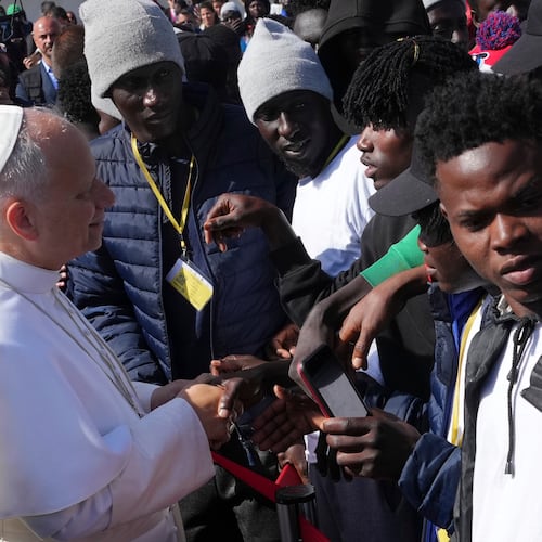 Pope Leo XIV meets migrants at the 'Las Raices' center, in San Cristobal de la Laguna, Tenerife, Spain, Friday, June 12, 2026. (AP Photo/Alessandra Tarantino)