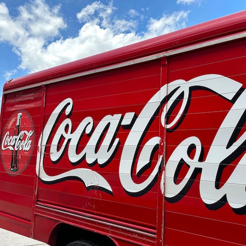 FILE - The Coca-Cola logo adorns the side of a delivery truck, May 15, 2024, in southeast Denver. (AP Photo/David Zalubowski, File)