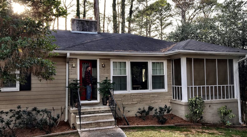 Trond Manskow is renting a house that connects Emory University to the city of Atlanta. Emory purchased the house at 1664 Briarcliff Road last year, bringing the university a step closer to becoming part of the city. MARK NIESSE / MARK.NIESSE@AJC.COM