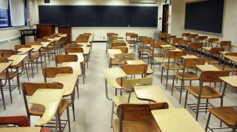 A substitute teacher in northwest Georgia is charged with sending nude photos of herself to 14-year-old boys.