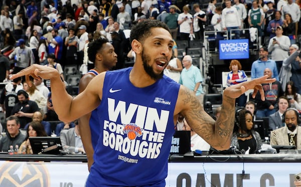 New York Knicks guard Cameron Payne celebrates after a win over the Detroit Pistons in Game 6 of an NBA basketball first-round playoff series Thursday, May 1, 2025, in Detroit. (AP Photo/Duane Burleson)