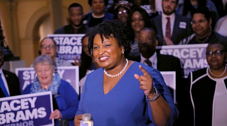 3/6/18 - Atlanta - Stacy Abrams qualified to run for governor this morning.  She was joined by her parents, Rev. Robert Abrams and Rev. Carolyn Abrams, who drove from Mississippi to surprise her, and supporters.   Qualifying for Georgia's 2018  elections began Monday and runs through Friday.  Georgia has races for Governor, Lieutenant Governor and other statewide posts, and every congressional seat nationwide is up for a vote in November.  BOB ANDRES  /BANDRES@AJC.COM