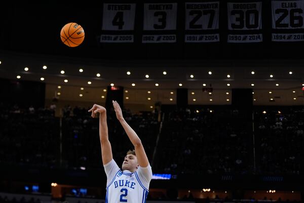 Duke forward Cooper Flagg (2) puts up a shot against Arizona during the first half of a Sweet 16 round NCAA college basketball tournament game, Thursday, March 27, 2025, in Newark, N.J. (AP Photo/Julia Demaree Nikhinson)
