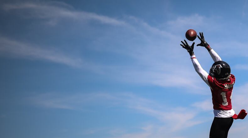 Atlanta Falcons wide receiver Justin Hardy (14) makes a catch during training camp, Saturday, July 28, 2018, in Flowery Branch, Ga. BRANDEN CAMP/SPECIAL