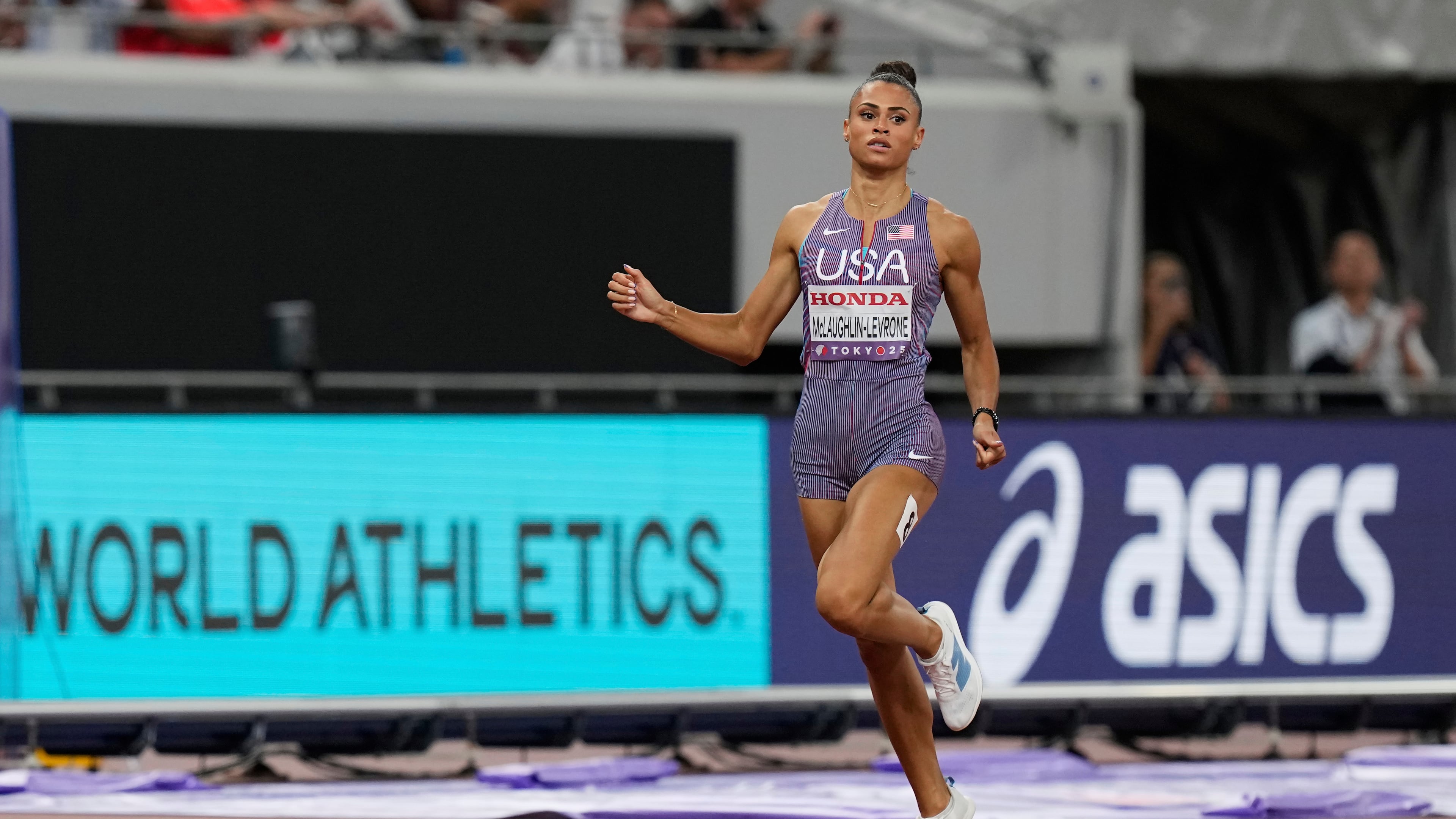 United States' Sydney McLaughlin-Levrone competes in the women's 400 meters semifinal at the World Athletics Championships in Tokyo, Tuesday, Sept. 16, 2025. (AP Photo/Eugene Hoshiko)