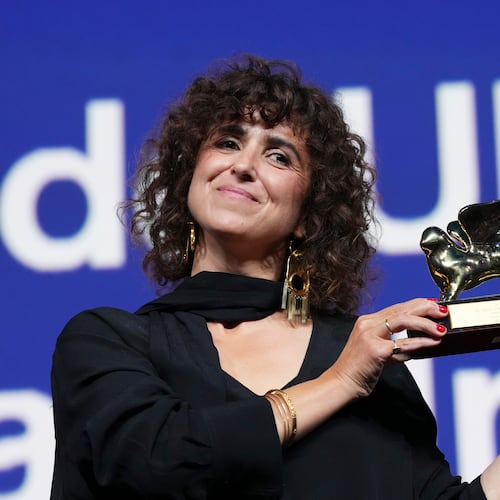 Director May el-Toukhy poses for photographers after receiving the Golden Lion for best film for 'Woman Unknown' during the closing ceremony of the 83rd edition of the Venice Film Festival in Venice, Italy, on Saturday, Sept. 12, 2026. (Photo by Scott A Garfitt/Invision/AP)