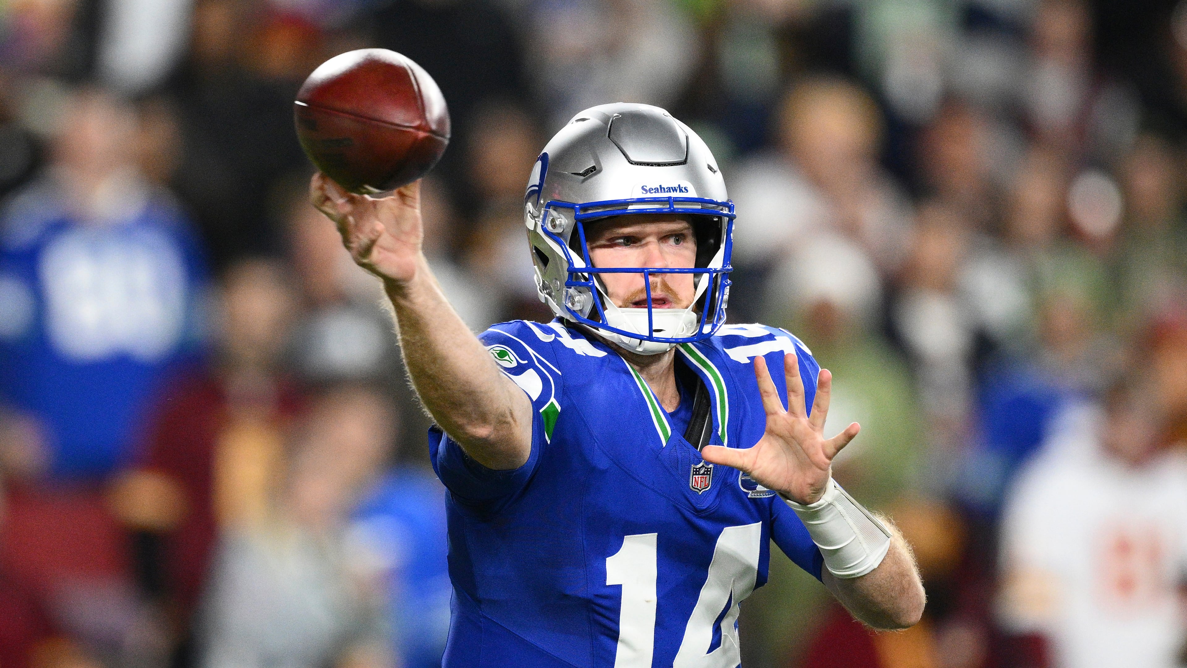 Seattle Seahawks quarterback Sam Darnold (14) passes the ball during the first half of an NFL football game against Washington Commanders, Sunday, Nov. 2, 2025, in Landover, Md. (AP Photo/Nick Wass)