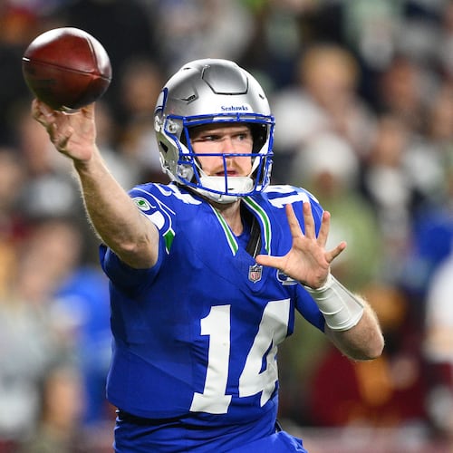Seattle Seahawks quarterback Sam Darnold (14) passes the ball during the first half of an NFL football game against Washington Commanders, Sunday, Nov. 2, 2025, in Landover, Md. (AP Photo/Nick Wass)