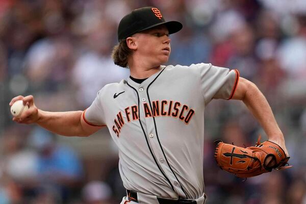 San Francisco Giants pitcher Hayden Birdsong (60) delivers against the Atlanta Braves in the first inning of a baseball game, Monday, July 21, 2025, in Atlanta. (AP Photo/Mike Stewart)