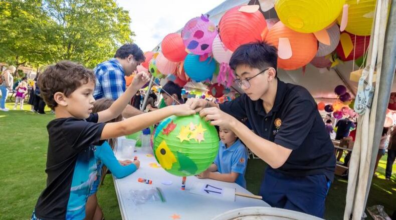 Come early to make a lantern and then march in Duluth’s Lantern Parade at Town Green on Friday, May 29. (Courtesy of Explore Gwinnett)