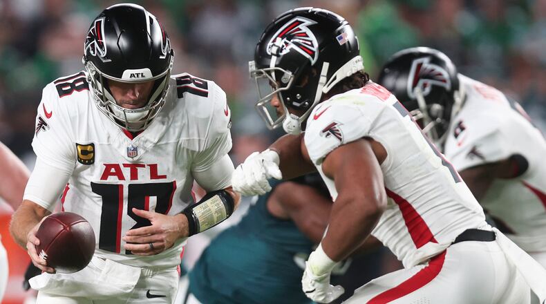 Atlanta Falcons quarterback Kirk Cousins fakes a handoff during the second quarter against the Philadelphia Eagles at Lincoln Financial Field on Monday, Sept. 16, 2024, in Philadelphia. (Monica Herndon/The Philadelphia Inquirer/TNS)
