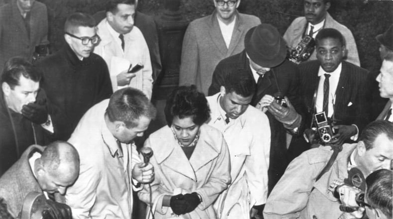 Charlayne Hunter and Hamilton Holmes arrive at the University of Georgia in January 1961. They were the school's first black students. Read AJC columnist Bill Torpy's story marking the 50th anniversary of UGA's integration. Charles Pugh/AJC