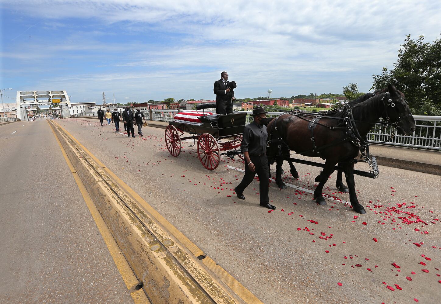John Lewis crosses Edmund Pettus Bridge for final time