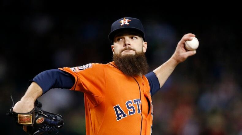 Houston Astros' Dallas Keuchel throws a pitch against the Arizona Diamondbacks during the first inning of a baseball game Friday, Oct. 2, 2015, in Phoenix. (AP Photo/Ross D. Franklin)