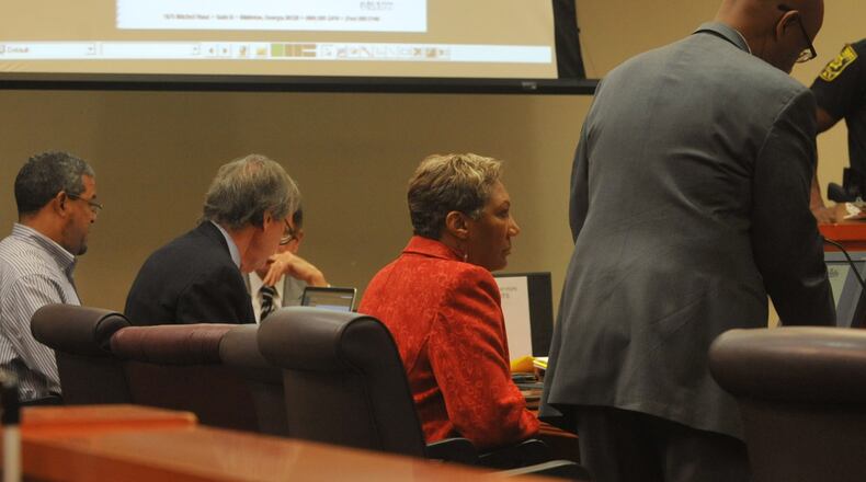 More than 3 1/2 years after Pat Reid and Tony Pope were first indicted, prosecutors began making their case to a jury Wednesday that the former husband and wife team had manipulated the DeKalb school district to pocket more than $1 million.