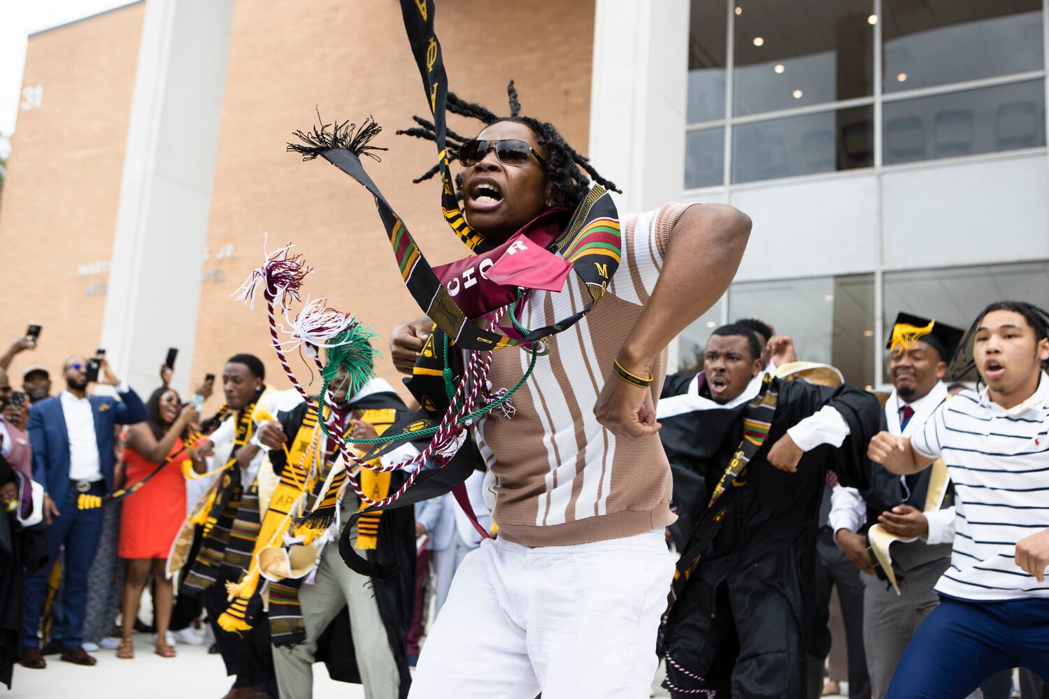 Members of Alpha Phi Alpha fraternity perform a step routine after the Morehouse College commencement ceremony on Sunday, May 21, 2023, on Century Campus in Atlanta. The graduation marked Morehouse College's 139th commencement program. CHRISTINA MATACOTTA FOR THE ATLANTA JOURNAL-CONSTITUTION