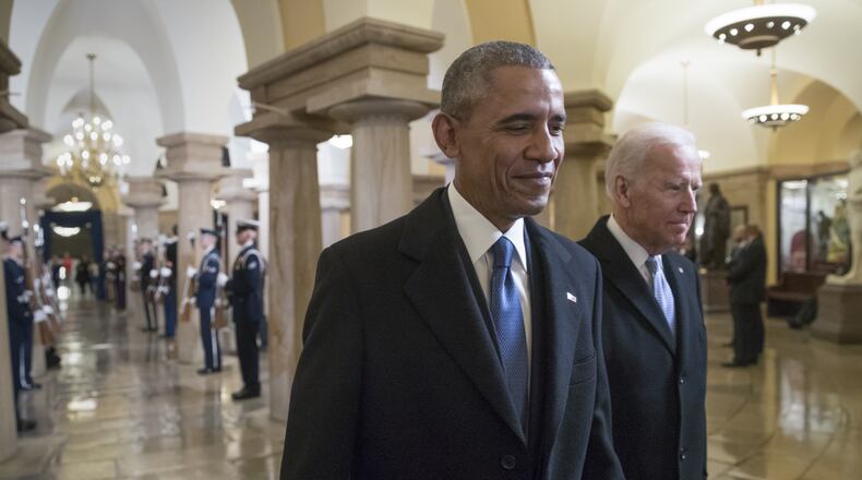 WASHINGTON, DC - JANUARY 20: President Barack Obama and Vice President Joe Biden walk through the Crypt of the Capitol for Donald Trump's inauguration ceremony, in Washington, January 20, 2017. (Photo by J. Scott Applewhite - Pool/Getty Images) *** BESTPIX ***