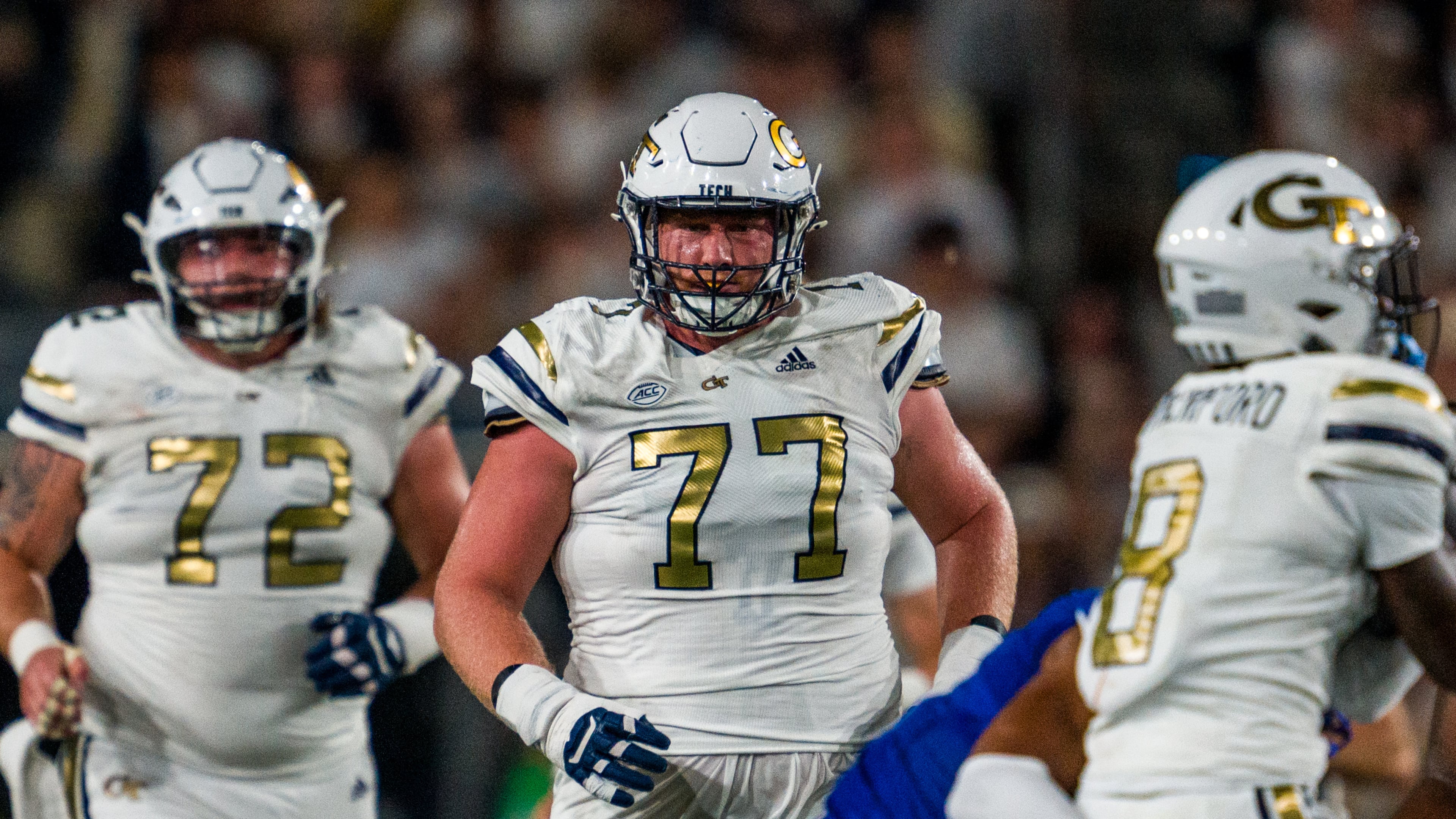 Georgia Tech offensive lineman Keylan Rutledge's (center) leadership will be a major facet of the Yellow Jackets' offensive success this season. Rutledge, or “Red” as he’s known to teammates, is revered around Bobby Dodd Stadium. (Danny Karnik/Georgia Tech Athletics 2024)