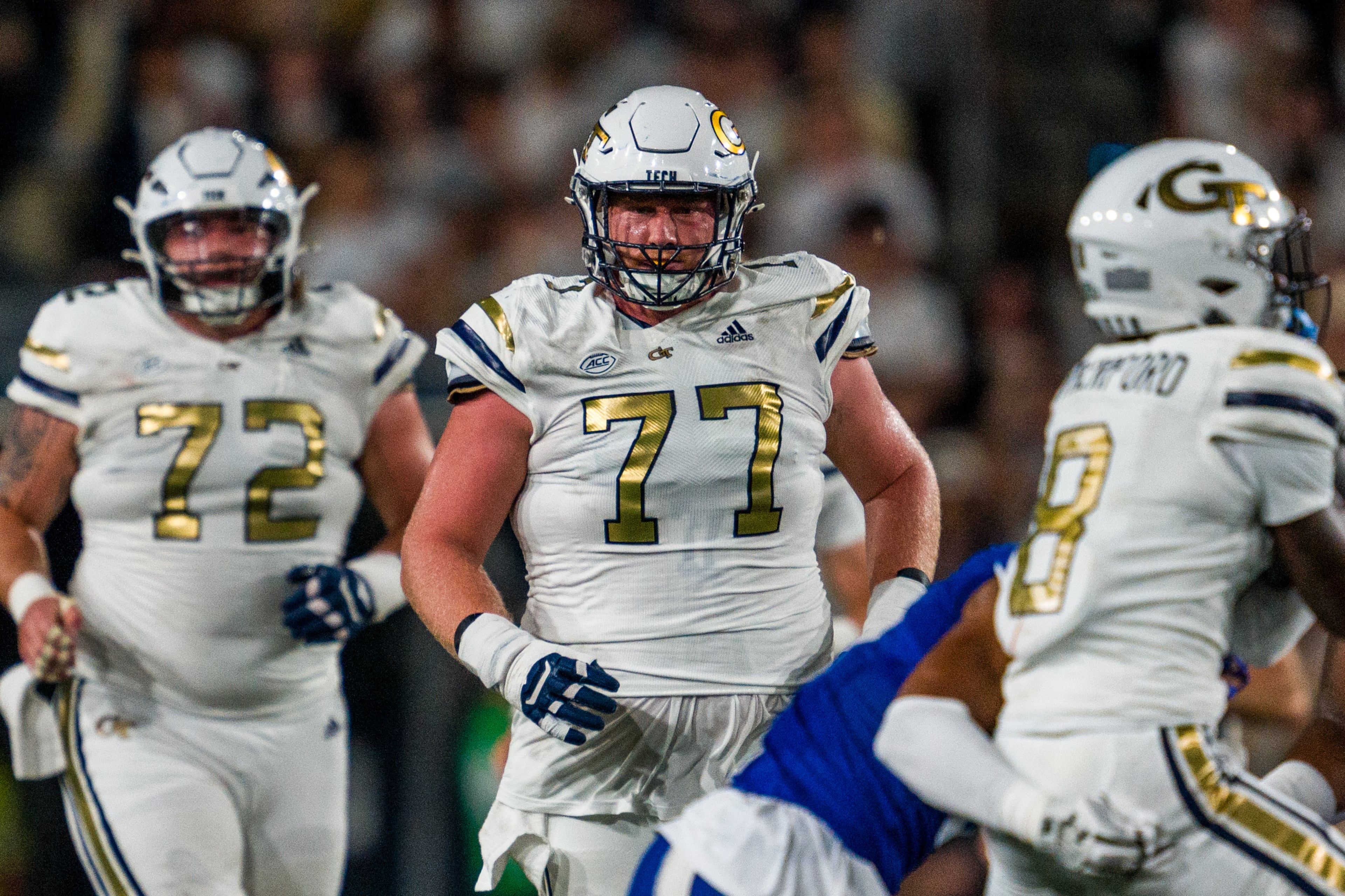 Georgia Tech offensive lineman Keylan Rutledge's (center) leadership will be a major facet of the Yellow Jackets' offensive success this season. Rutledge, or “Red” as he’s known to teammates, is revered around Bobby Dodd Stadium. (Danny Karnik/Georgia Tech Athletics 2024)