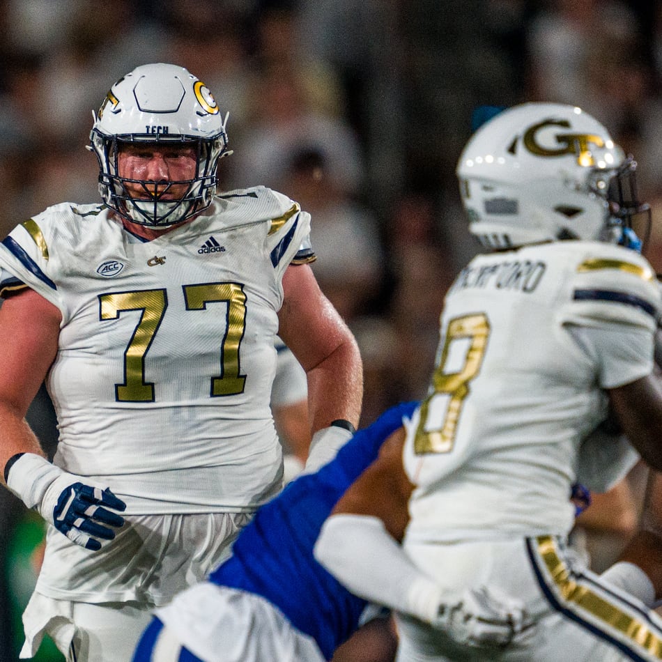 Georgia Tech offensive lineman Keylan Rutledge (center) in action in a game against Georgia State on Aug. 31, 2024 at Bobby Dodd Stadium in Atlanta. (Danny Karnik/Courtesy of Georgia Tech Athletics)