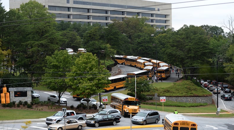 New rules in the wake of last week's mass shooting at a Florida high school will tighten up entry and restrict food delivery at North Atlanta High School. JOHNNY CRAWFORD / JCRAWFORD@AJC.COM