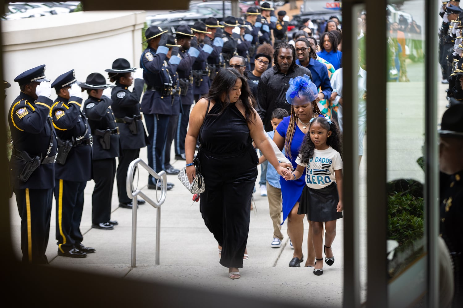 Flags fly at half-staff for slain DeKalb officer’s memorial service

