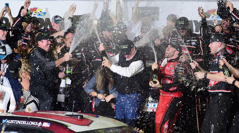 DAYTONA BEACH, FL - FEBRUARY 18: Austin Dillon, driver of the #3 DOW Chevrolet, celebrates with champagne in Victory Lane after winning the Monster Energy NASCAR Cup Series 60th Annual Daytona 500 at Daytona International Speedway on February 18, 2018 in Daytona Beach, Florida. (Photo by Jared C. Tilton/Getty Images)