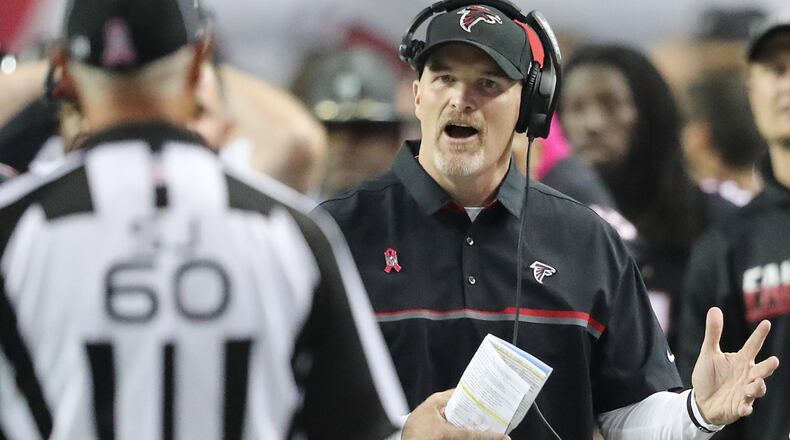 October 23, 2016 Atlanta: Falcons head coach Dan Quinn looks for a call from the official as wide receiver Julio Jones is knocked out of bounds in over time after making a catch that was ruled out of bounds against the Chargers in an NFL football game on Sunday, Oct. 23, 2016, in Atlanta. Curtis Compton /ccompton@ajc.com