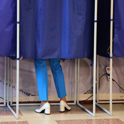 A voter fills-in a ballot during Russia's parliamentary election in Donetsk, in the Russian-controlled part of the Donetsk region, Ukraine, Friday, Sept. 18, 2026. (AP Photo)