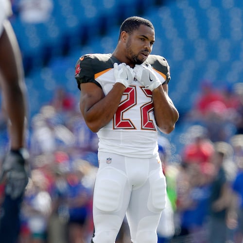FILE - Tampa Bay Buccaneers running back Doug Martin (22) stretches before an NFL football game against the Buffalo Bills, Sunday, Oct. 22, 2017, in Orchard Park, N.Y. (AP Photo/Adrian Kraus,File)