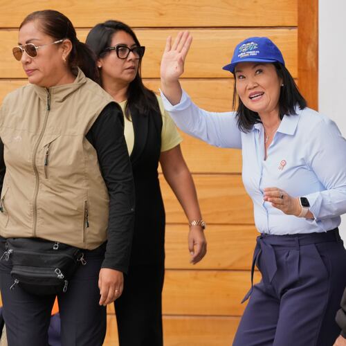 President-elect Keiko Fujimori, waves to reporters as she leaves her home in Lima, Peru, Friday, July 3, 2026. (AP Photo/Martin Mejia)