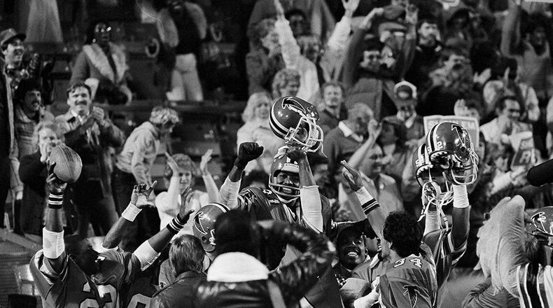 A "Big Ben" desperation pass caught by Willy "White Shoes" Johnson gave the Atlanta Falcons a victory over the San Francisco 49ers and a ride atop teammates' shoulders for Johnson in Atlanta, Nov. 21, 1983. The pass from Steve Bartkowski in the final two seconds won, 28-24. (Charles Kelly/AP)