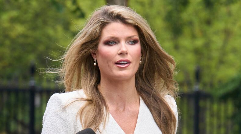 FILE - Lindsey Halligan, outside of the White House, Aug. 20, 2025, in Washington. (AP Photo/Jacquelyn Martin, File)