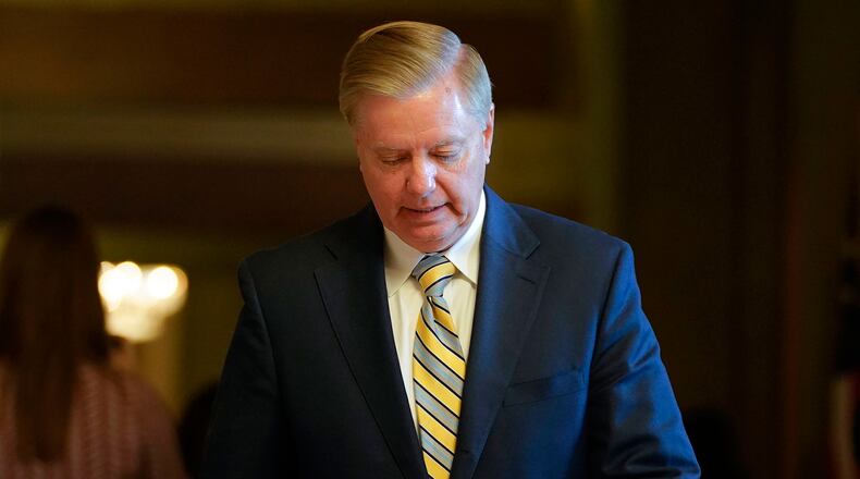 FILE - Sen. Lindsey Graham, R-S.C., leaves a meeting in the office of Senate Majority Leader Mitch McConnell, R-Ky., at the Capitol in Washington, Nov. 13, 2018. (AP Photo/Pablo Martinez Monsivais, File)