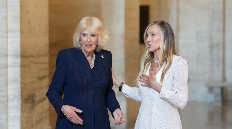 Actress Sarah Jessica Parker, right, talks with Queen Camilla at the New York Public Library, Wednesday, April 29, 2026, in New York. (Adam Gray/Pool Photo via AP)