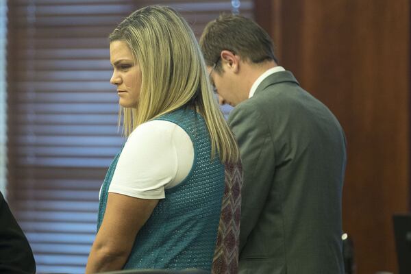 Jennifer Rosenbaum (left) and Joseph Rosenbaum wait for closing arguments during their trial in front of Henry County Judge Brian Amero at Henry County Superior Court in McDonough on Friday, July 26, 2019. (Alyssa Pointer/alyssa.pointer@ajc.com)
