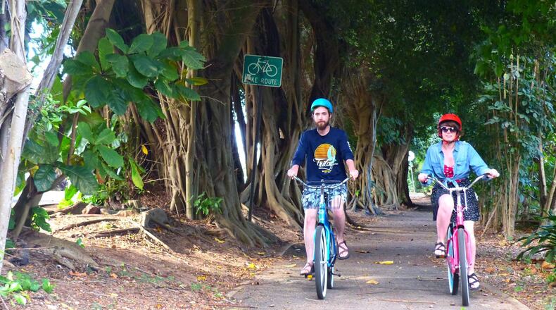 Rented cruiser bikes and a paved bike path are a great way to get around on Oahu’s North Shore. (Brian J. Cantwell/Seattle Times/TNS)